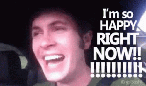 A Man Is Laughing With The Words " I 'M So Happy Right Now !!! " Behind Him GIF