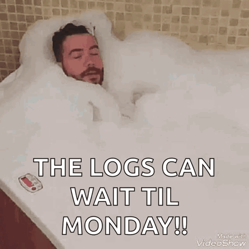 a man is laying in a bathtub filled with foam and the words `` the logs can wait till monday '' .
