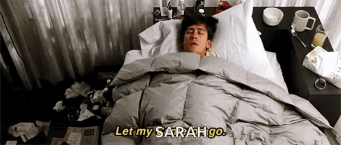 A Man Is Laying In A Bed With A Blanket And Says Let My Sarah Go GIF