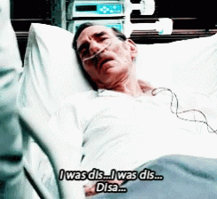 A Man Is Laying In A Hospital Bed And Says I Was Dis I Was Dis Disa GIF
