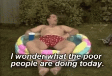Man In Pool With I Wonder What The Poor Are Doing GIF