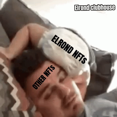 A Man Is Laying In Bed With An Ice Pack On His Forehead That Says Elrond Nfts And Other Nfts GIF