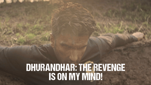 a man is laying in the dirt with the words " dhurandhar the revenge is on my mind " above him