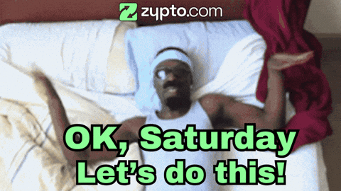 A Man Is Laying On A Bed With The Words Ok Saturday Let 'S Do This On The Bottom GIF