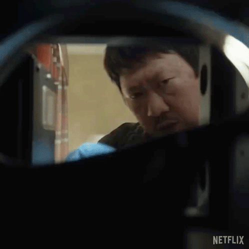 Man Looking At Netflix Ad GIF