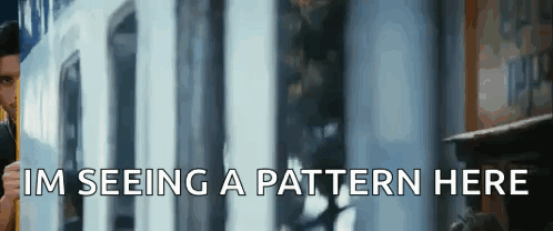 A Man Is Looking Out Of A Train Window With The Words I 'M Seeing A Pattern Here Written Below Him . GIF