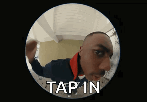 A Man Is Looking Through A Peephole And The Words Tap In Are On The Screen GIF