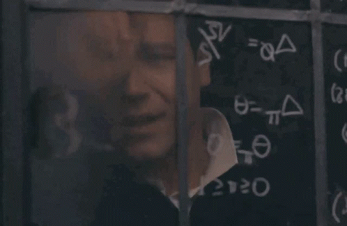 A Man Is Looking Through A Window At A Chalkboard With Math Equations On It GIF