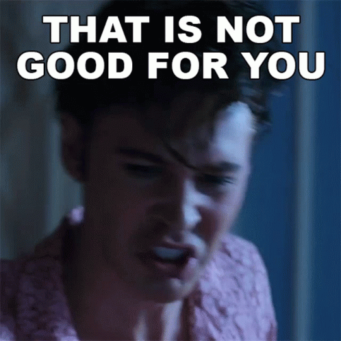 A Man Is Making A Face With The Words That Is Not Good For You Behind Him GIF