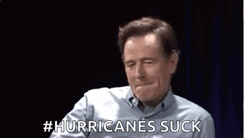 A Man Is Making A Funny Face And Saying `` Hurricanes Suck '' With His Hand . GIF