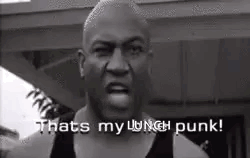 A Man Is Making A Funny Face And Saying `` That 'S My Lunch Punk '' . GIF