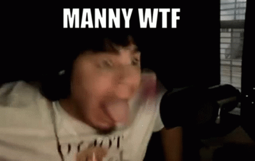 A Man Is Making A Funny Face In Front Of A Microphone While Wearing Headphones . GIF