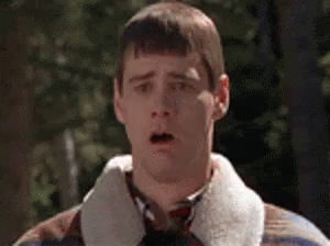 A Man Is Making A Funny Face With His Mouth Open . GIF