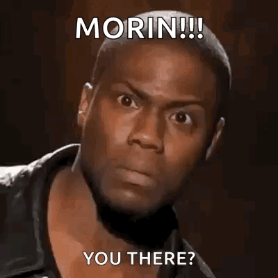 a man is making a funny face with the words `` morin !!! you there ? '' written on it .