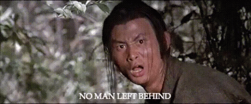 A Man Is Making A Funny Face With The Words No Man Left Behind Above Him GIF