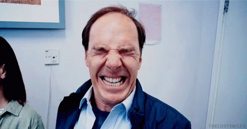 a man is making a funny face with the words the lost smiles visible below him