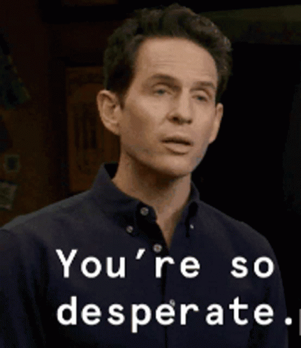 A Man Is Making A Funny Face With The Words You 'Re So Desperate Behind Him GIF