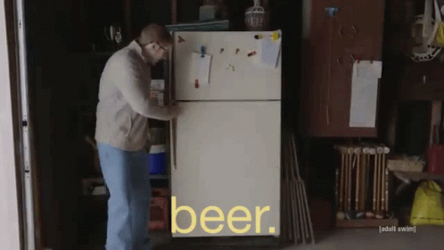 A Man Is Opening A Refrigerator That Says Beer On The Door GIF