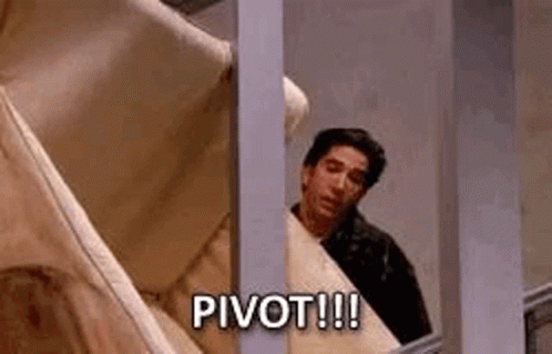 A Man Is Peeking Out Of A Window Holding A Piece Of Paper And Saying `` Pivot ! '' GIF