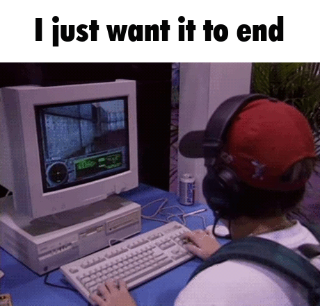 A Man Is Playing A Video Game On A Computer With The Words I Just Want It To End Below Him GIF