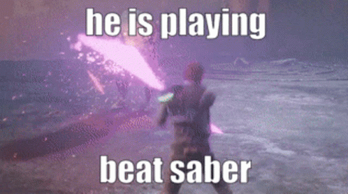 A Man Is Playing A Video Game With A Purple Light Saber GIF