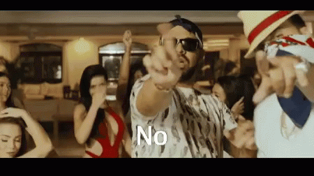 A Man Is Pointing At A Group Of Women And The Word No Is On The Screen . GIF