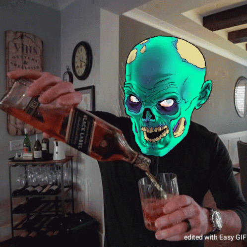 A Man Is Pouring A Bottle Of Black Label Scotch Into A Glass GIF