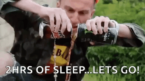 A Man Is Pouring Energy Drink Into His Mouth . GIF
