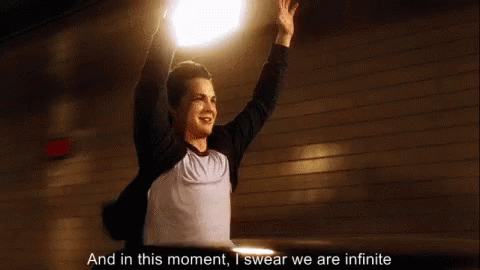 A Man Is Raising His Arms In The Air And Saying `` And In This Moment , I Swear We Are Infinite '' GIF
