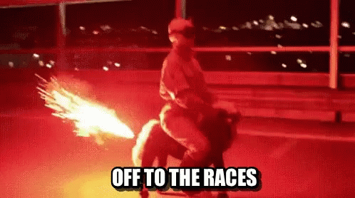 A Man Is Riding A Horse With Fire Coming Out Of Its Tail And The Words Off To The Races Written Below Him GIF