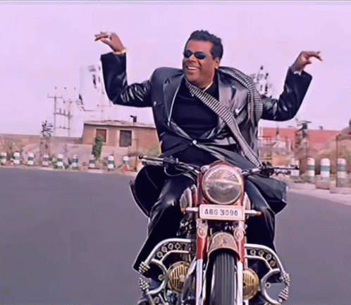 a man is riding a motorcycle with a license plate that says a86 3096