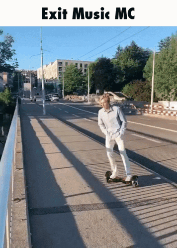 A Man Is Riding A Skateboard Across A Bridge With The Words Exit Music Mc Above Him GIF