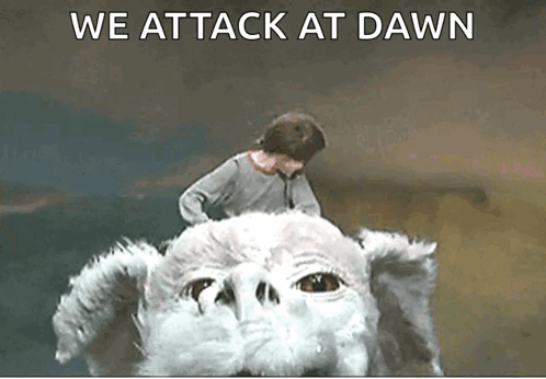 A Man Is Riding On The Back Of A White Dog With The Words We Attack At Dawn Written Below It GIF