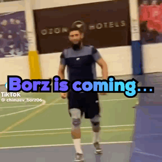A Man Is Running On A Court With The Words ' Borz Is Coming ' Written On It GIF