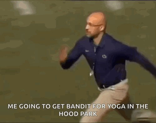 A Man Is Running To Get Bandit For Yoga In The Hood Park GIF