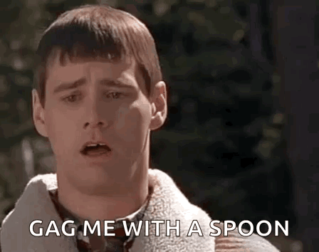 A Man Is Saying `` Gag Me With A Spoon '' While Holding A Spoon In His Hand . GIF
