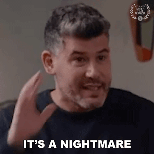 Man Saying It's A Nightmare With Hand Front Of Face GIF