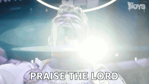 A Man Is Saying Praise The Lord With His Eyes Closed GIF