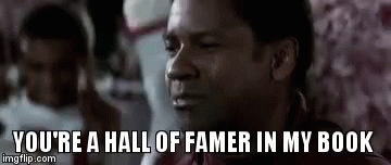 A Man Is Saying `` You 'Re A Hall Of Famer In My Book '' In Front Of A Crowd . GIF