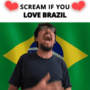 A Man Is Screaming In Front Of A Brazilian Flag GIF