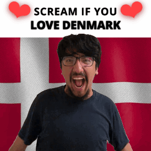 A Man Is Screaming In Front Of A Denmark Flag GIF