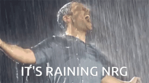 A Man Is Singing In The Rain With The Words `` It 'S Raining Nrg '' Written On The Bottom . GIF