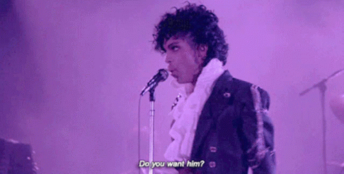 A Man Is Singing Into A Microphone And Asking Do You Want Him . GIF