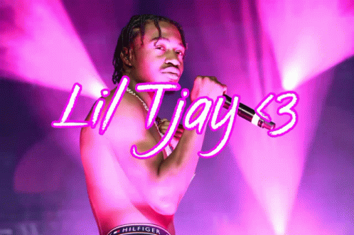 A Man Is Singing Into A Microphone With Lil Tjay 3 Written In Neon GIF