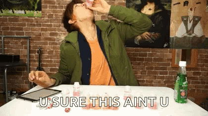 A Man Is Sitting At A Table With A Bottle Of Sprite And A Tablet And Says U Sure This Aint U GIF
