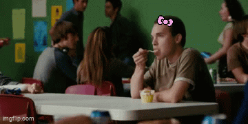 Man With Hello Kitty Bow Eating Ice Cream GIF