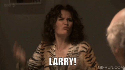 A Man Is Sitting At A Table With A Plate Of Food And A Glass Of Wine While A Woman Says What GIF