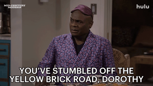 A Man Is Sitting At A Table With A Plate Of Food And Says You 'Ve Stumbled Off The Yellow Brick Road GIF