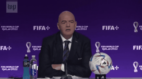 A Man Is Sitting At A Table With A Soccer Ball And Says " Today I Feel " GIF