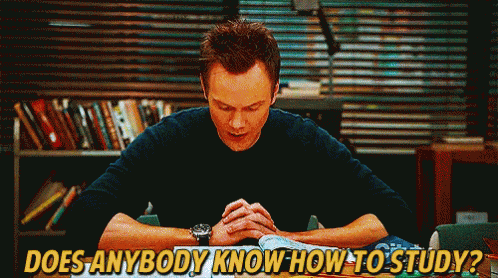 A Man Is Sitting At A Table With His Hands Folded And The Words " Does Anybody Know How To Study " Below Him GIF